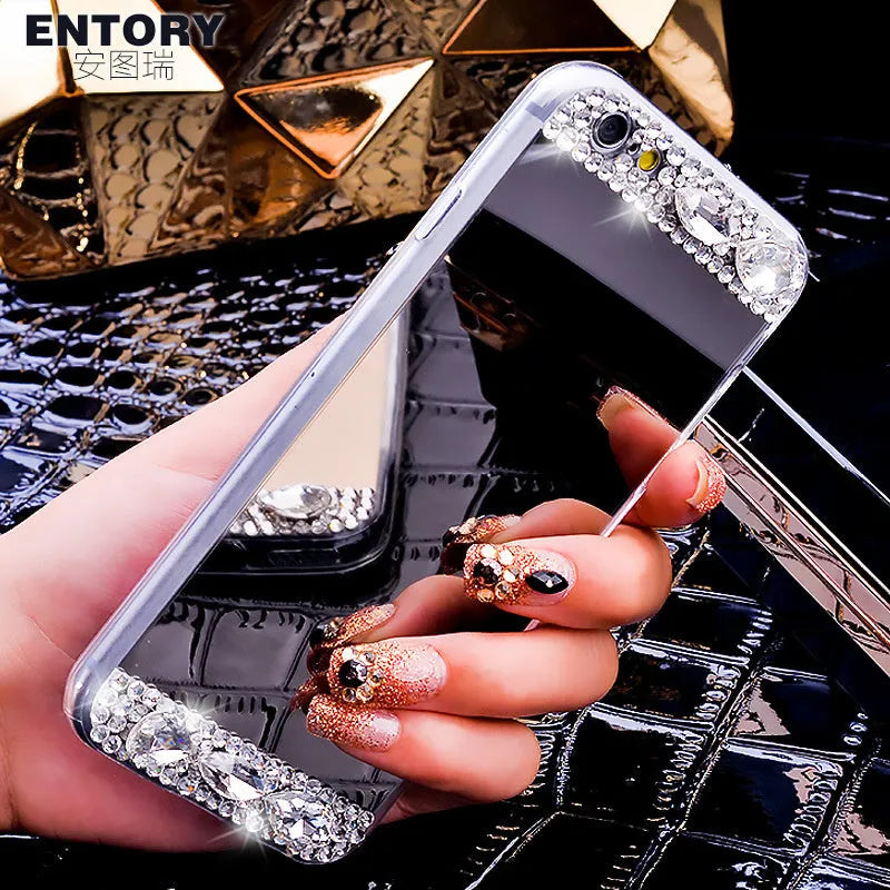 Gold rhinestone silicone back case on a Huawei smartphone.