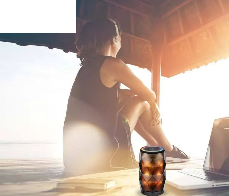 Black crystal diamond-cut Coke can shaped Bluetooth speaker with colourful lighting effects.