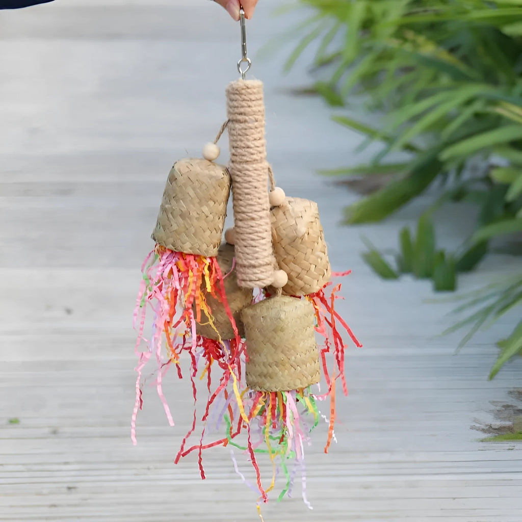 Colourful shredded paper bird chewing toy made from natural wood and sisal rope for parrots