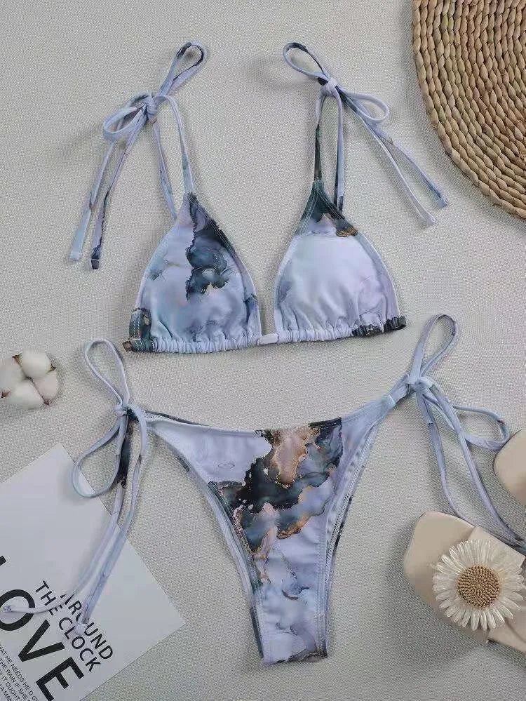 Women's high-waist marble tie-dye print bikini set with U-neck top.