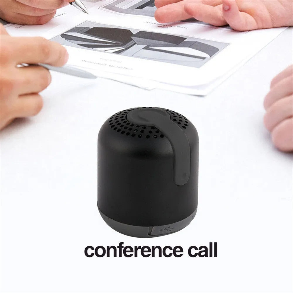 Hieha XQ11 mini Bluetooth speaker with heavy metal design in black, showing compact size and 360 degree sound capability