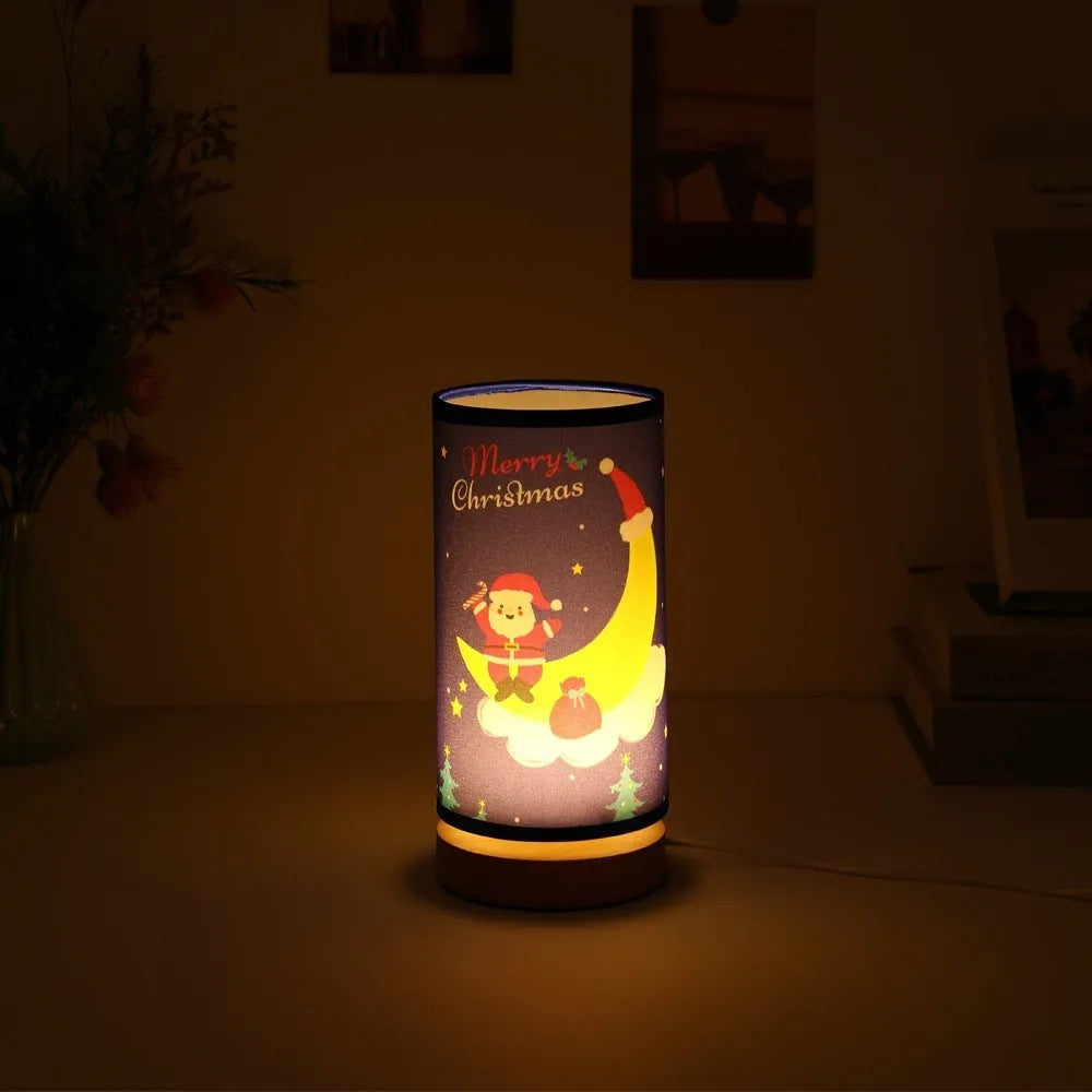 Moon-shaped Santa Claus USB LED night light with a bamboo base.