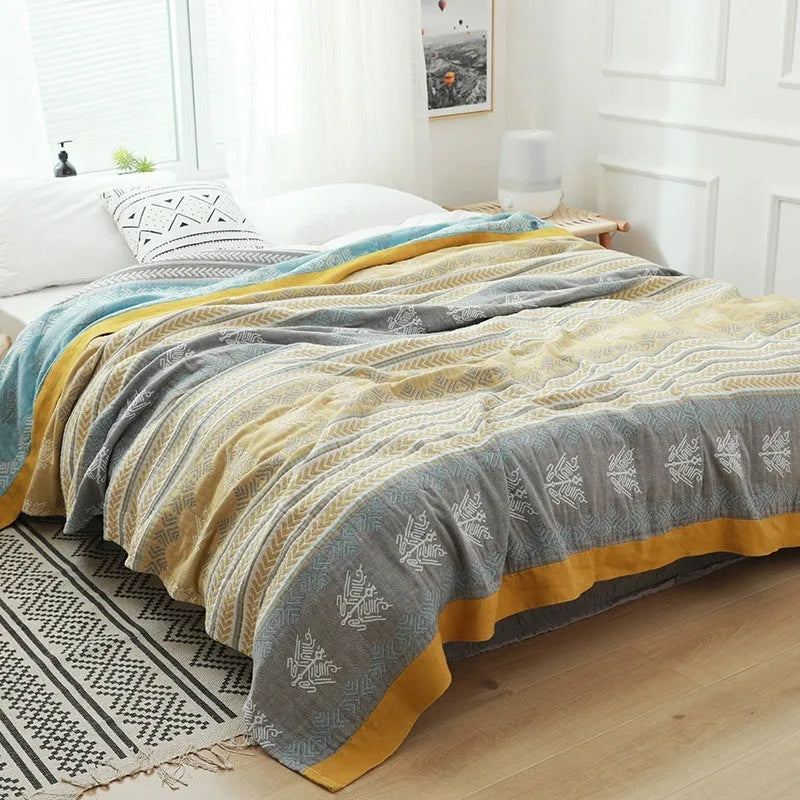 Pure cotton five-layer gauze bed blanket in modern simplicity style, shown in blue roulette wheel pattern.