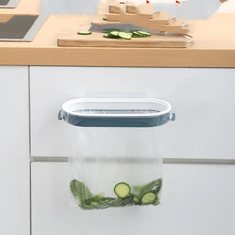 Blue plastic kitchen garbage bag storage rack mounted on wall for bin liner organisation