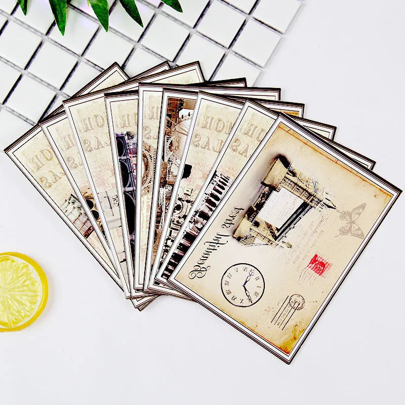 Set of nine minimalist cartoon-style postcards depicting retro Paris Eiffel Tower and historic sites