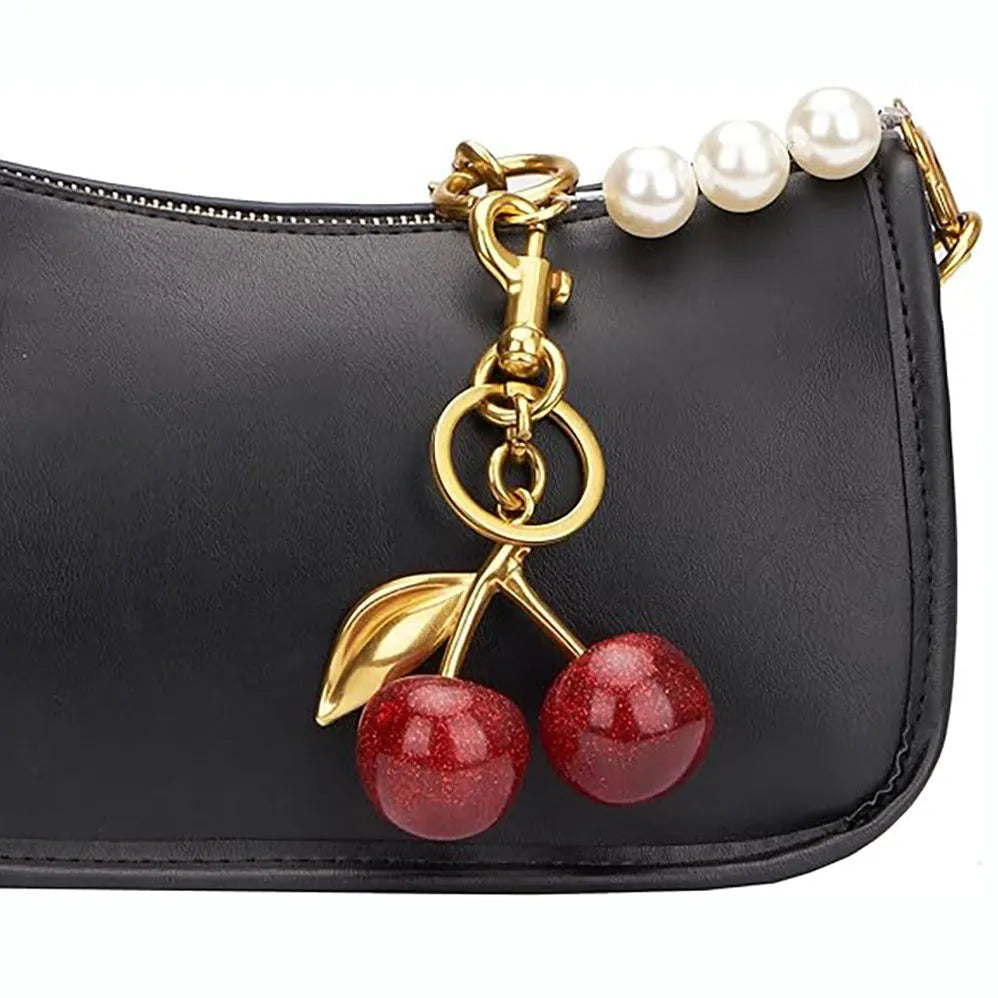 Red zinc alloy cherry-shaped keychain pendant with three-dimensional design