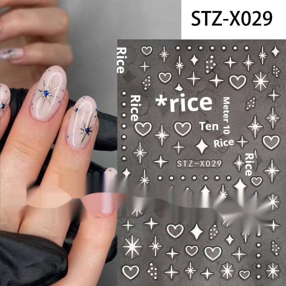 Sheet of black and silver love heart pattern nail art stickers with a plastic nail patch.
