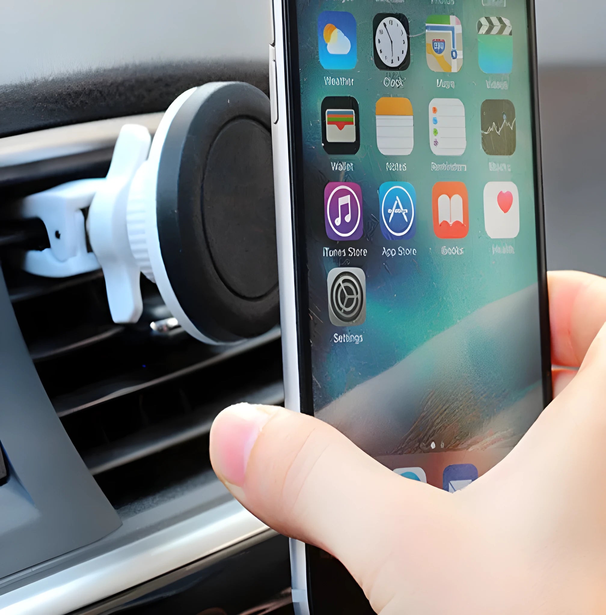 Cross border patented vehicle mounted magnetic handset holder in black, blue, and grey colours for car phone use.