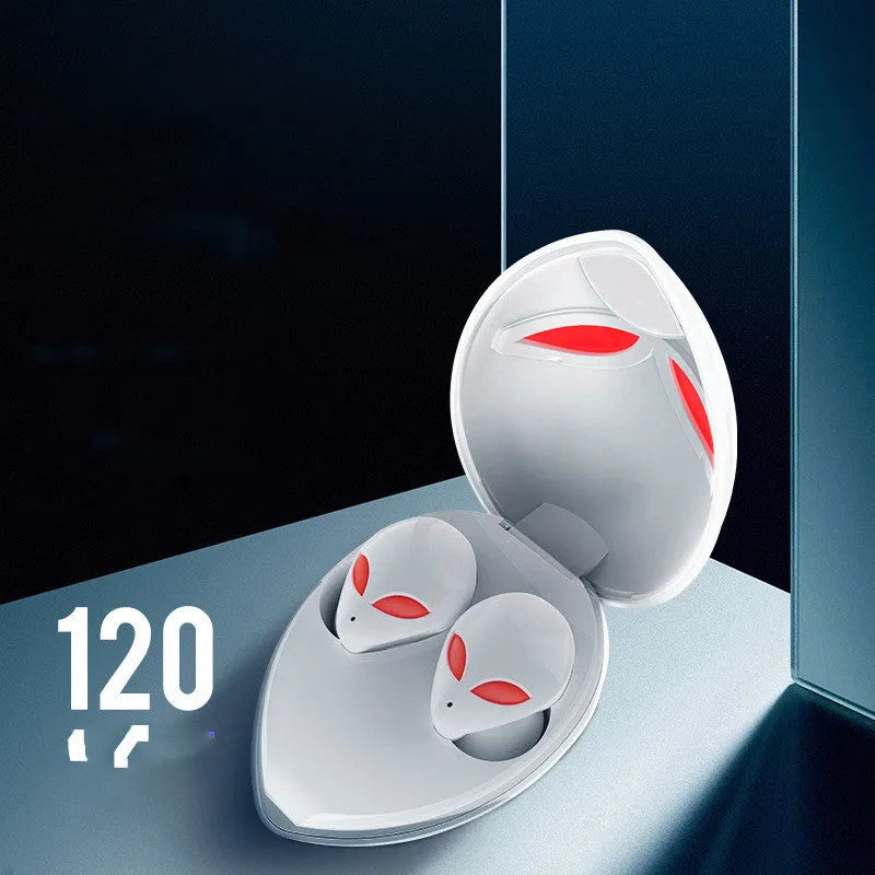 Alien-themed Creative Outer T8 Starman black wireless earbuds with red LED lights next to charging case.