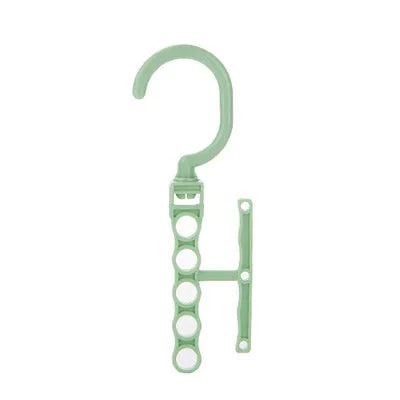 Blue revolving plastic wardrobe hanger with five hanging branches and a central handle for space saving