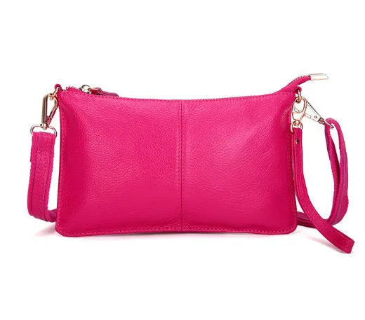 Lady cowhide slant bag in apricot showing top layer leather texture and dual straps