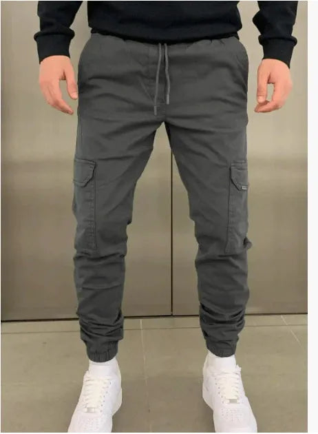 Men's loose fit casual trousers with dimensional patch pockets in light blue colour