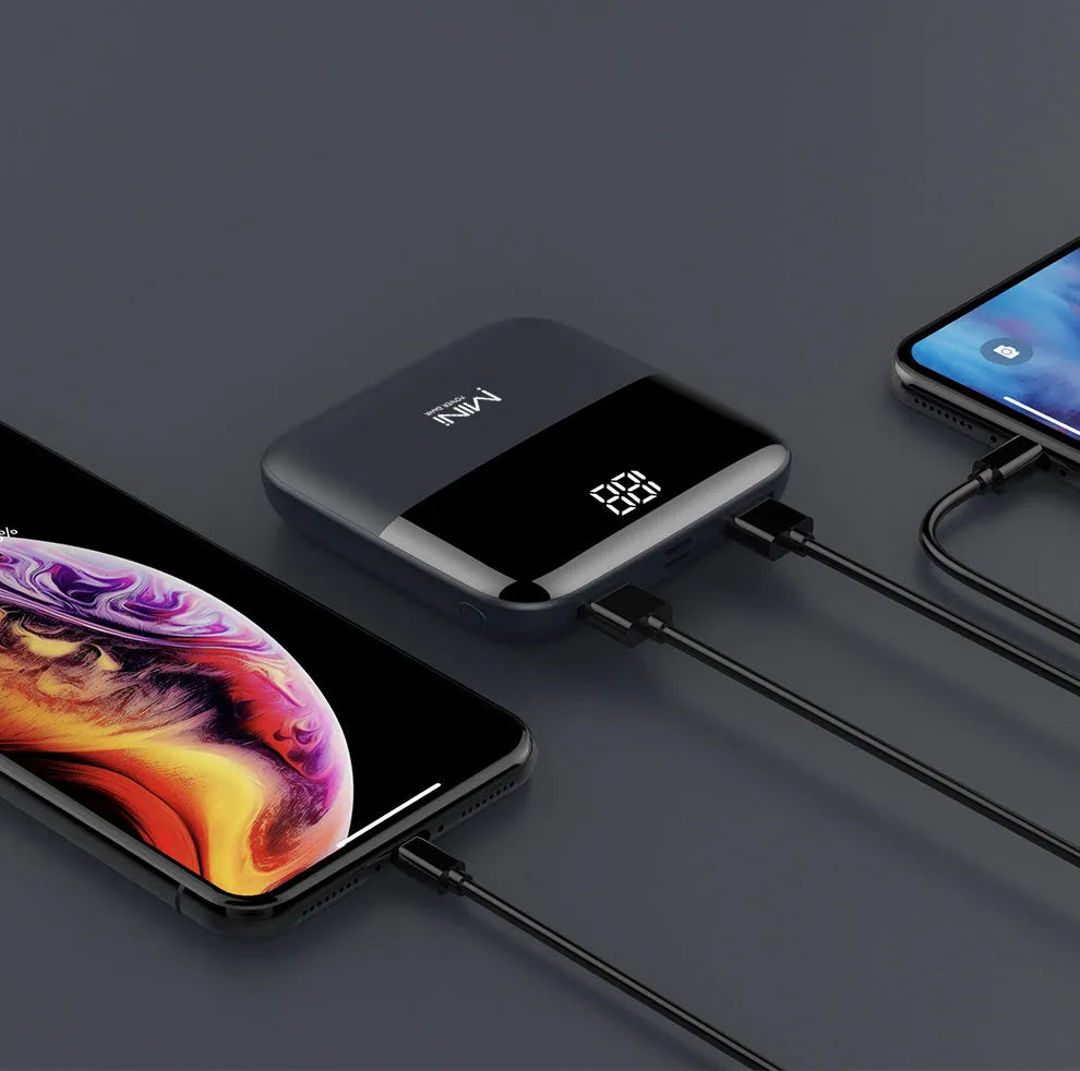 Portable 10000mAh power bank with digital display and dual USB outputs