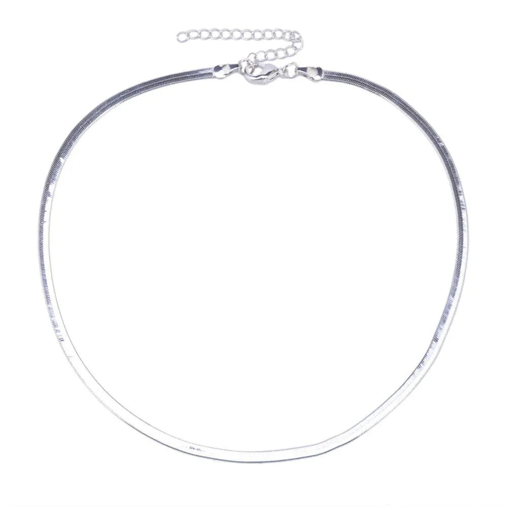Star Goddess gold duo layering choker necklace on display