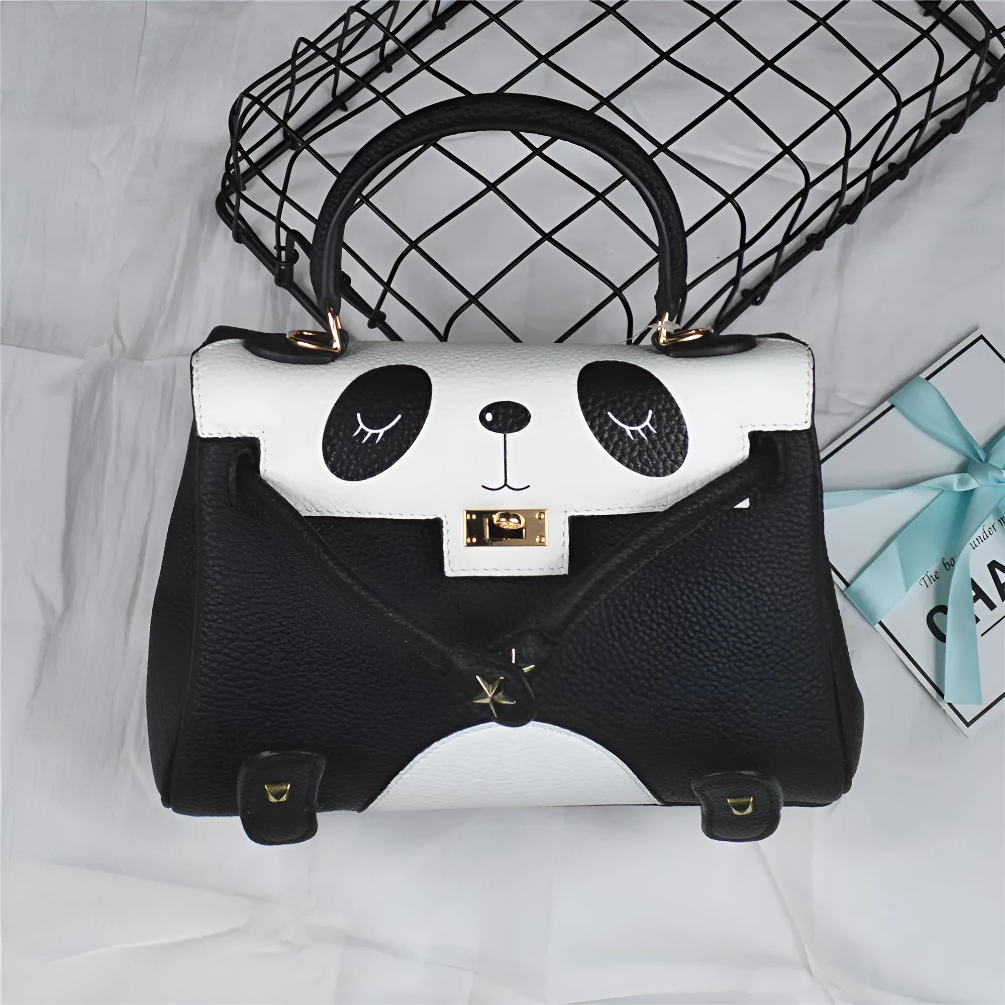 Panda print cowhide leather handbag in horizontal square shape showing animal pattern