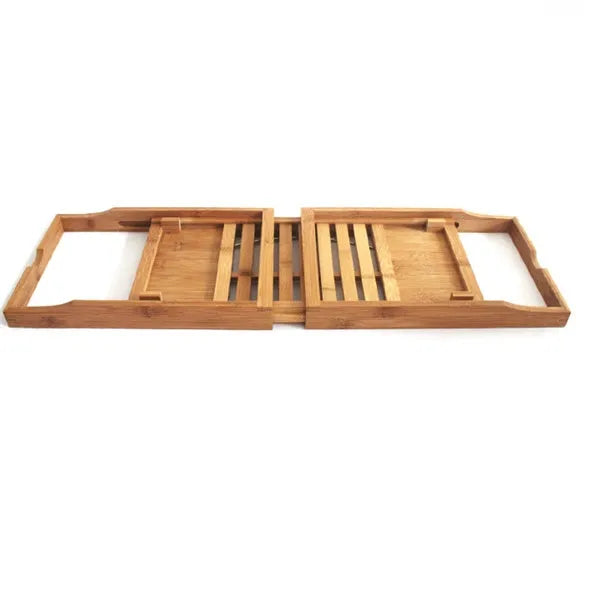 Natural bamboo bathtub caddy tray with one shelf resting on a bath edge.