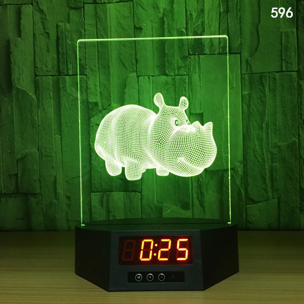 3D glowing dolphin shaped LED table lamp with remote control on a bedside table.