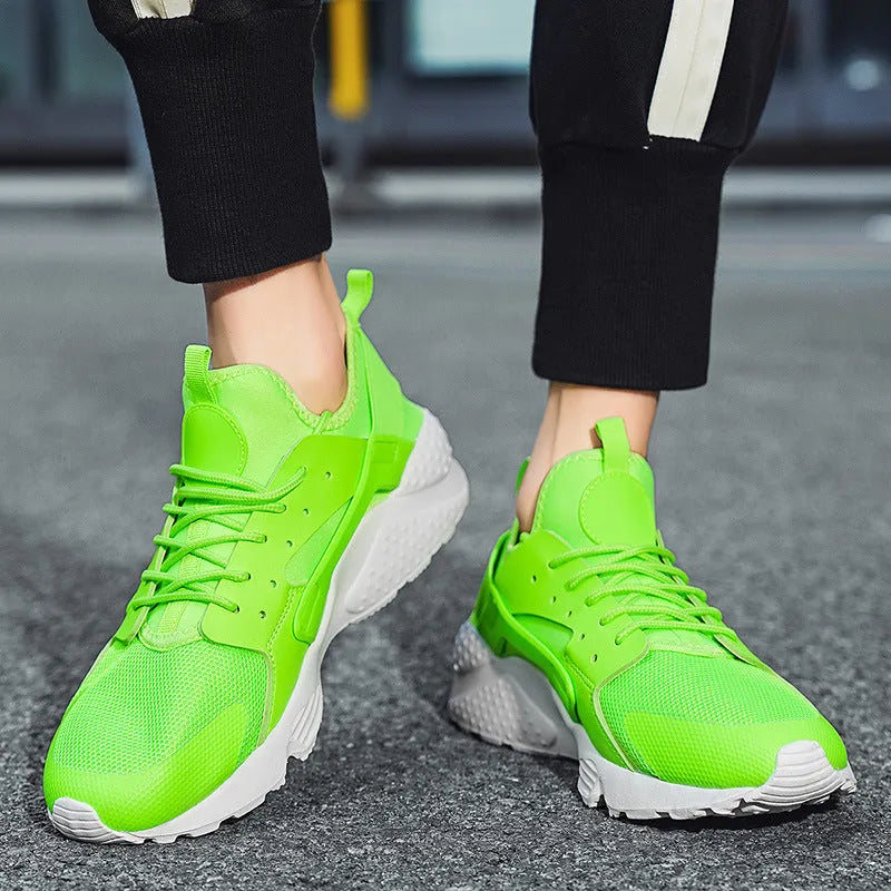 Men's low top casual shoes with cross shoulder straps in fluorescent red, green, or yellow.