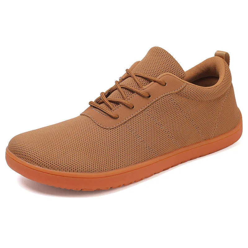 Men's low top walking shoes in Flyknit with non-slip rubber sole, shown in black colour with lace-up front.