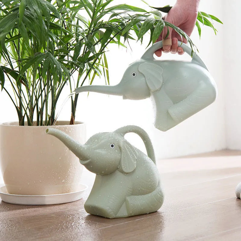 Pink elephant-shaped watering can with long nozzle for children's gardening