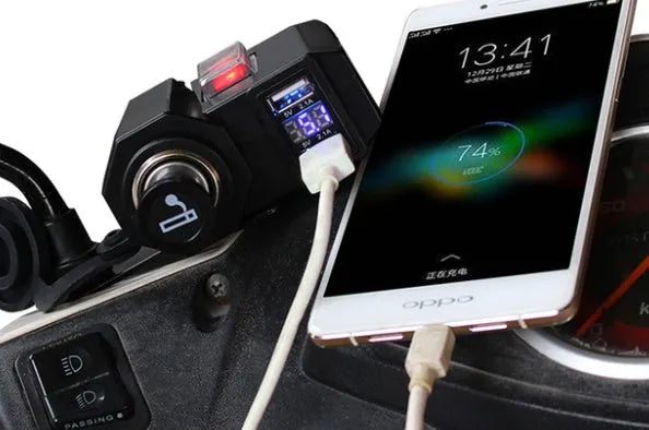 Black dual USB waterproof motorcycle charger with voltmeter mounted on handlebar