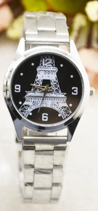 Black dial wrist watch with Eiffel Tower silhouette on stainless steel strap