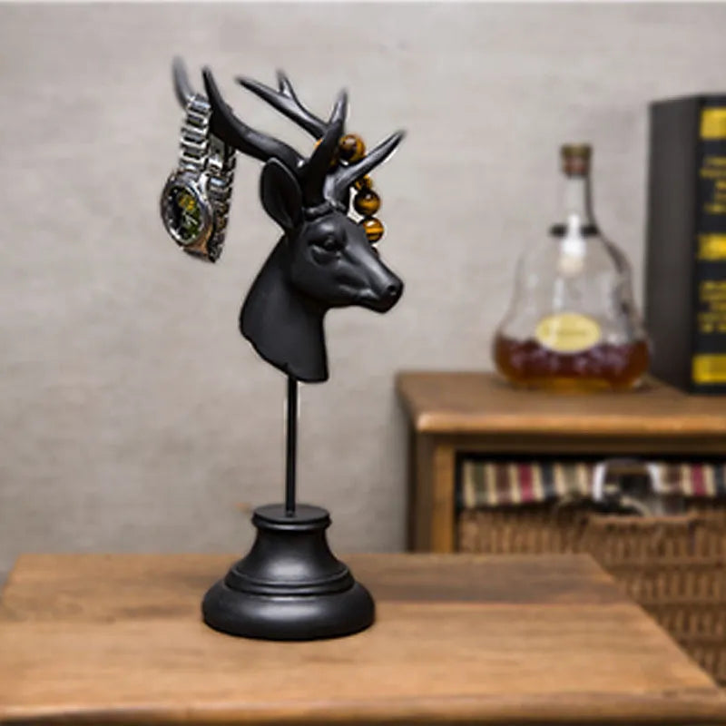 Hand-carved natural resin animal statue in black, white, and wood colour, 32cm tall.