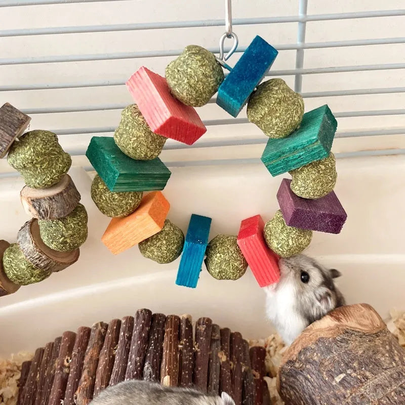 Hamster chew toy with decorative straw ball ring for guinea pigs and rabbits