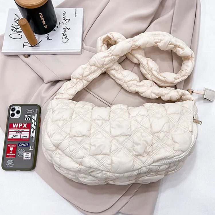 Women's nylon shoulder messenger bag in beige colour showing adjustable strap and dimensions