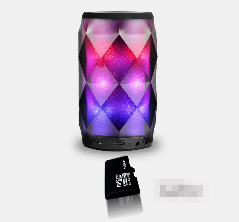 Black crystal diamond-cut Coke can shaped Bluetooth speaker with colourful lighting effects.