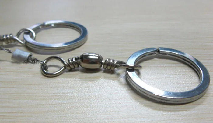 70cm stainless steel survival wire saw with thumb rings showing 600mm cutting blade
