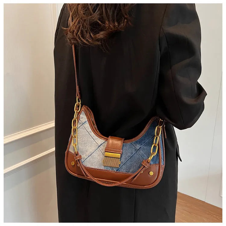 Brown denim women's shoulder bag with chain detailing and bucket shape design