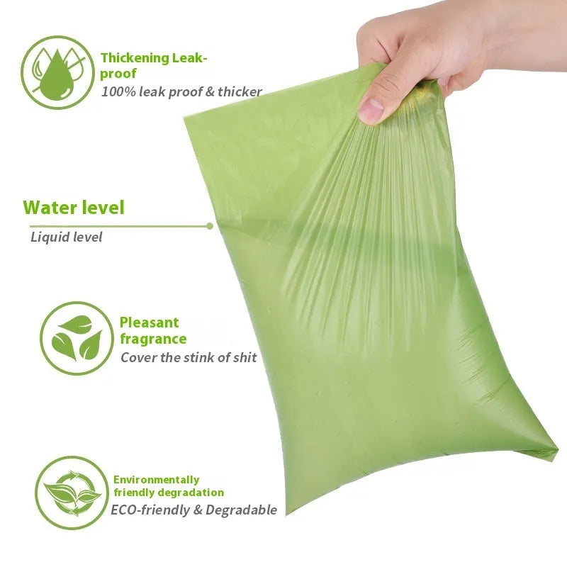 Degradable pet waste bags in green, black, blue, purple and orange colours with dispenser