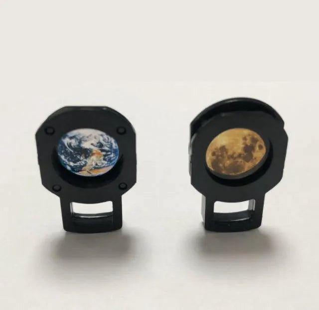 Earth and moon LED projector lamp on its adjustable hose bracket, showing USB cable.