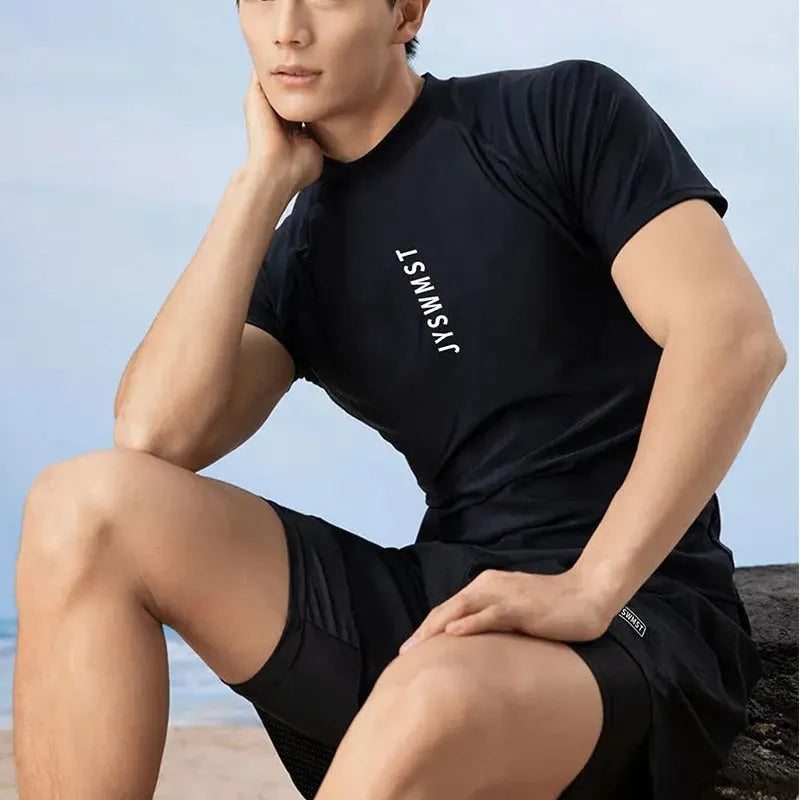 Men's plus size polyester swimsuit set showing top and trousers on a hanger