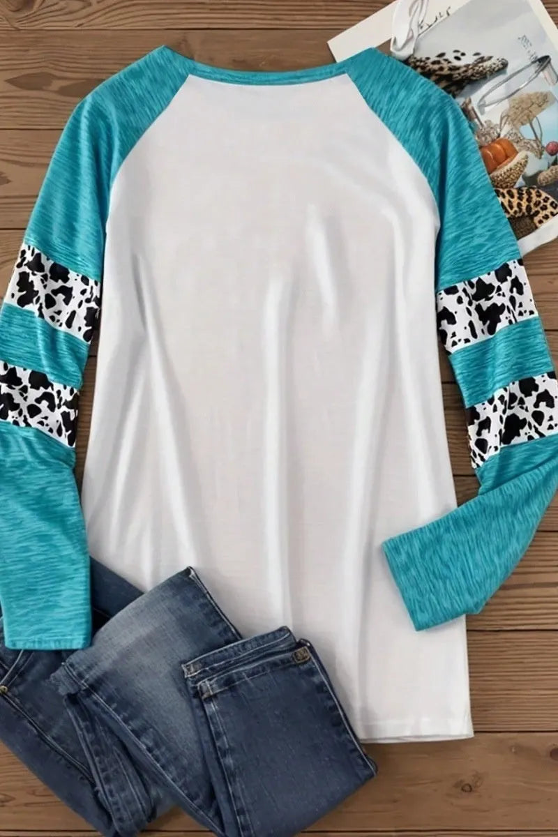 Sky blue long sleeve t-shirt with a large 3D digital printed Halloween pumpkin design on the front.