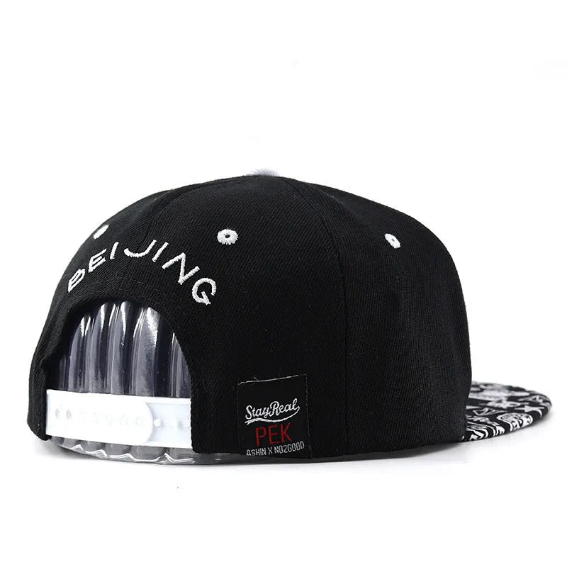 Unisex cotton baseball cap with letter embroidery available in black and white featuring adjustable dome crown design