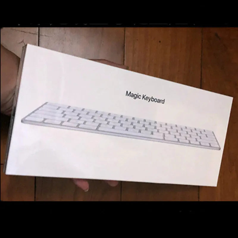 Apple G6 Bluetooth wireless keyboard in white with aluminium construction and multimedia keys
