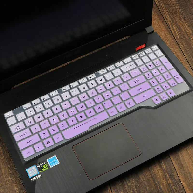 ASUS Flight laptop keyboard protective film cover shown in gradient blue on a laptop