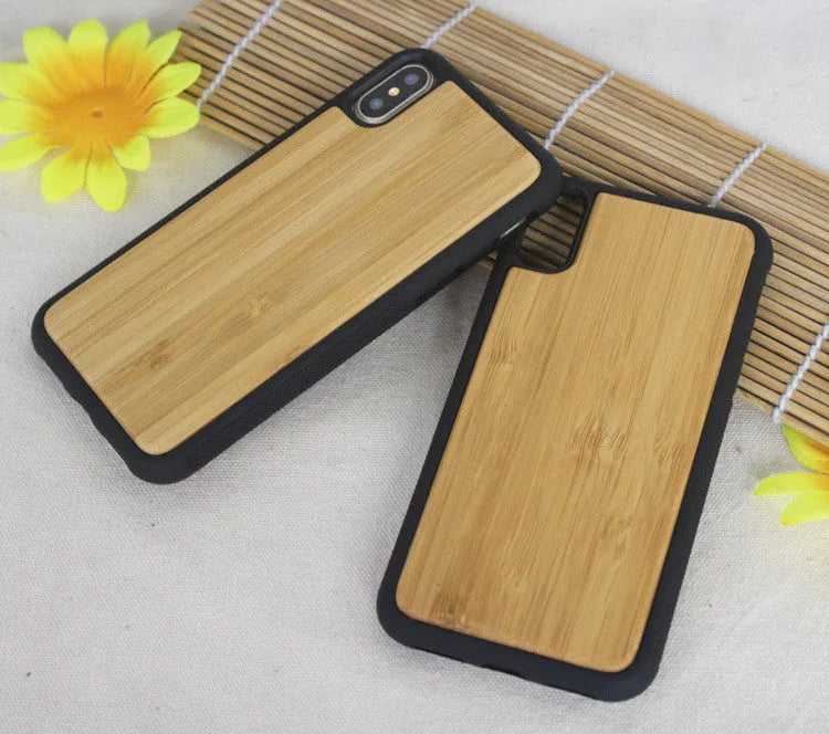 Wooden hybrid phone case with a carbonised bamboo back and black TPU bumper for iPhone.