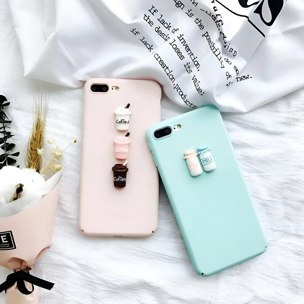 Soft pink TPU iPhone case with a raised white 3D cartoon cat design on the back.