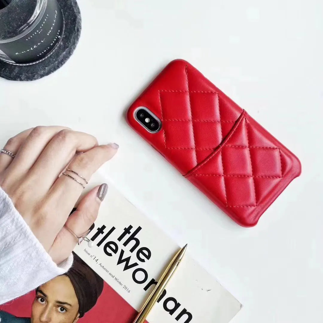 Genuine leather phone case for Apple iPhone in black, pink and red colour options.