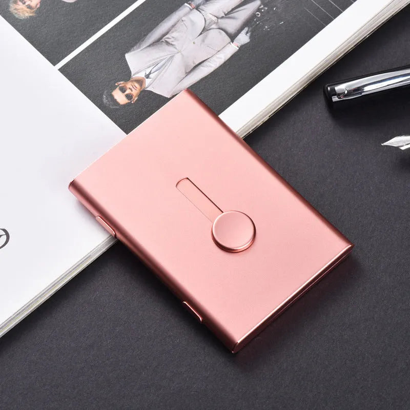 Hand push aluminium alloy RFID blocking business card case in black, 93x65x12mm, holding 6 cards