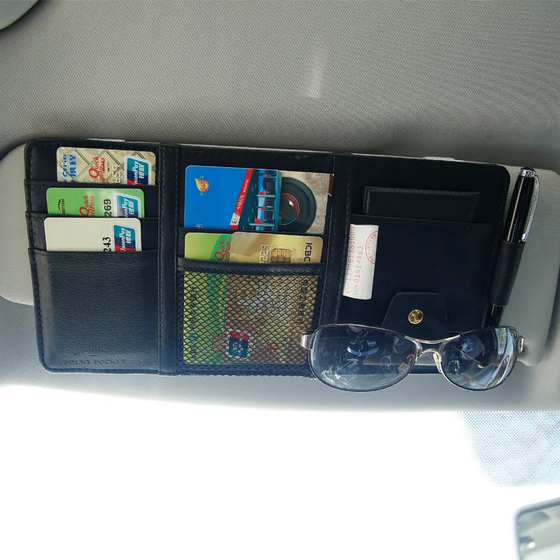 Car sun visor clip in PU leather measuring 30x14cm, shown in black, with multiple storage slots