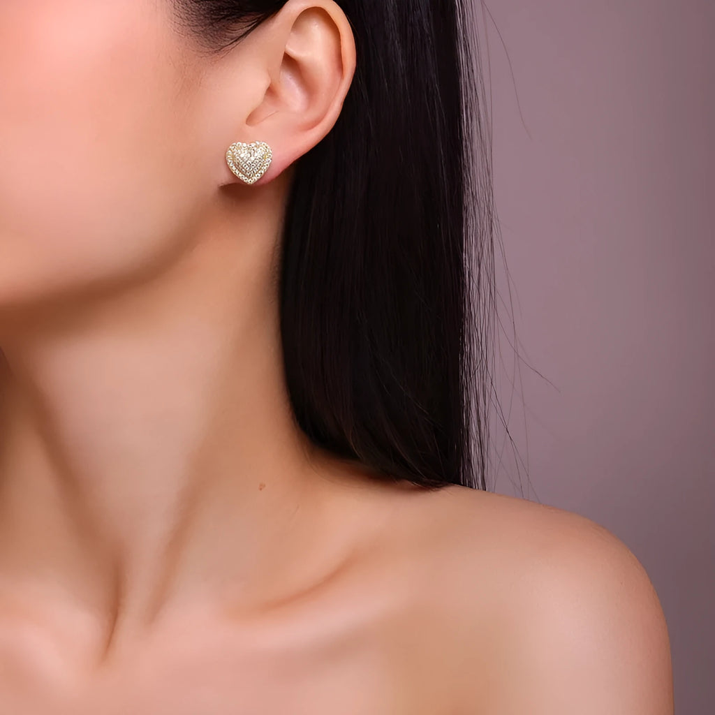 Gold-coloured heart-shaped moissanite stud earrings on S925 silver with secure fastening back