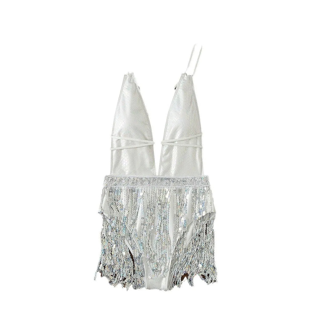 White women's one-piece swimsuit with deep V-neck and decorative tassels.