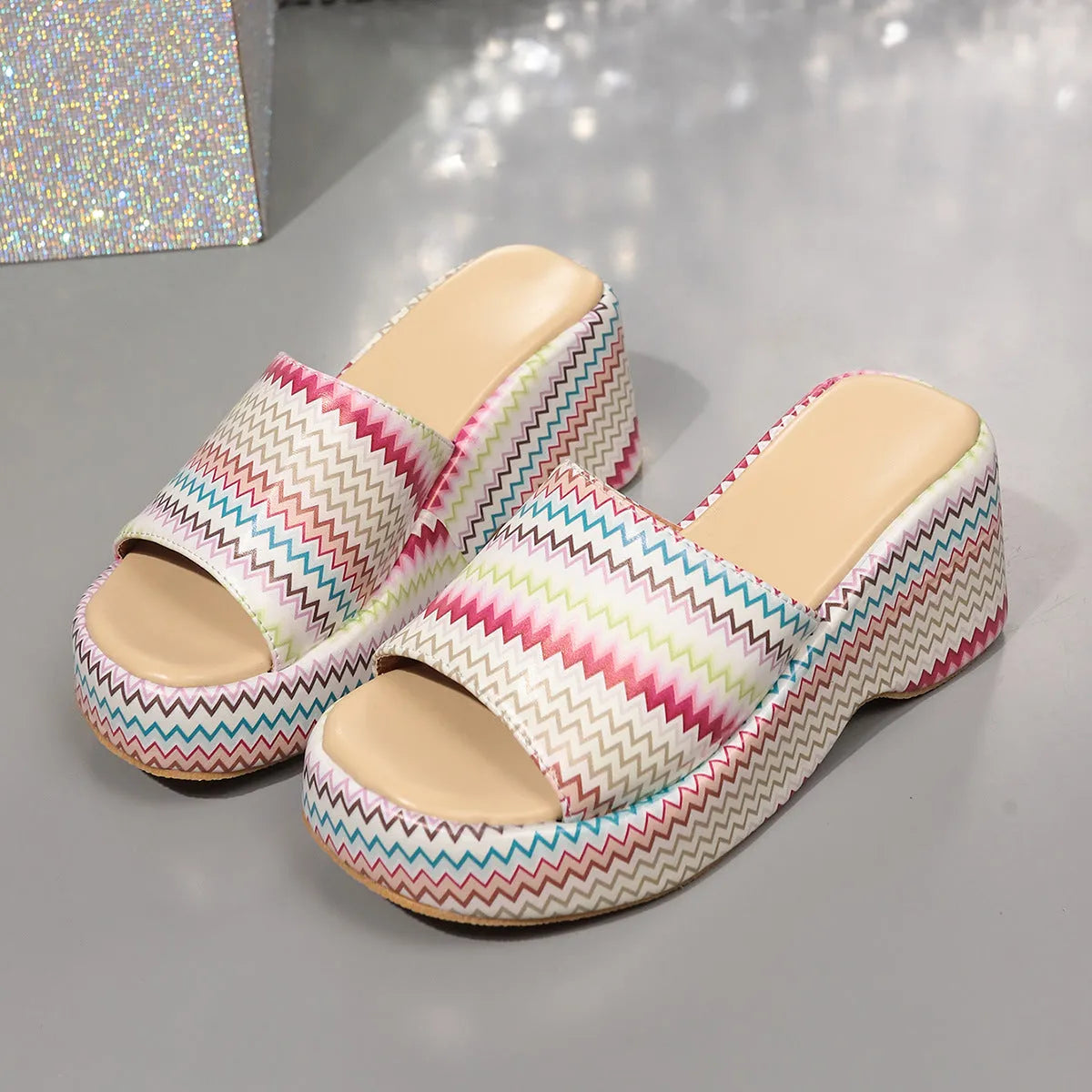 Women's beige wedge sandals with colourful wave print, thick rubber sole, and fish mouth open toe