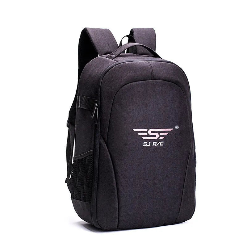 Large black Oxford fabric drone backpack showing multiple internal organiser pockets for laptop and camera.