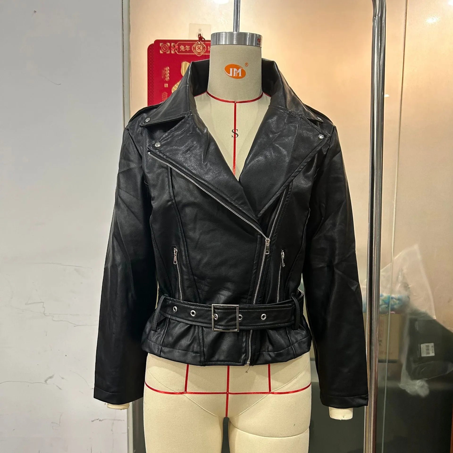 Punk style short jacket with a Peter Pan collar and drawstring waist in black, blue, or green.