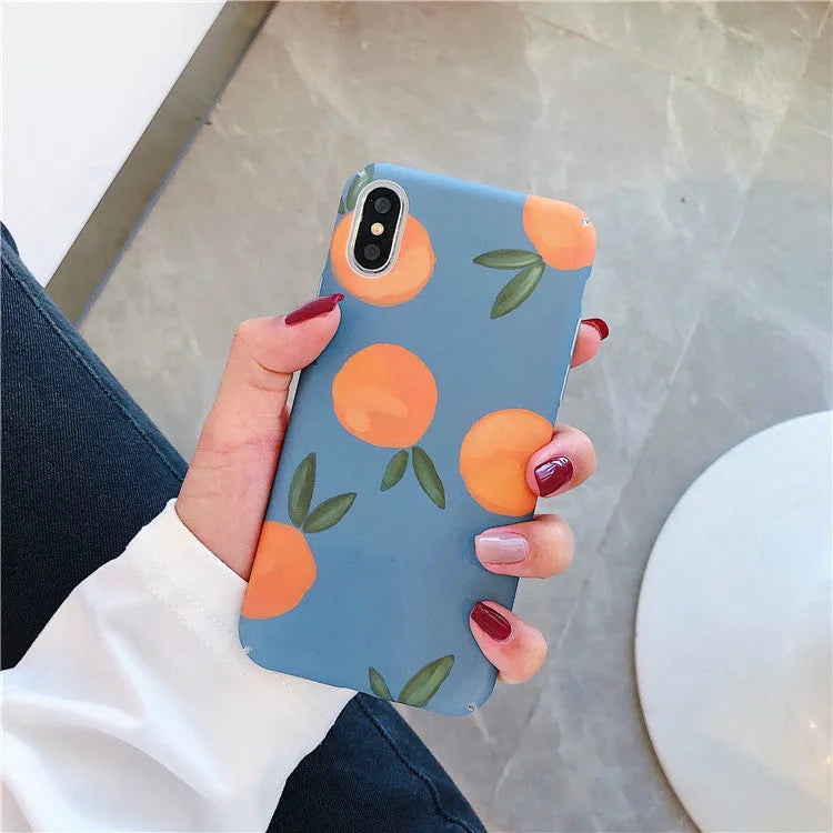 Orange retro plastic iPhone back cover with blue and water background design.